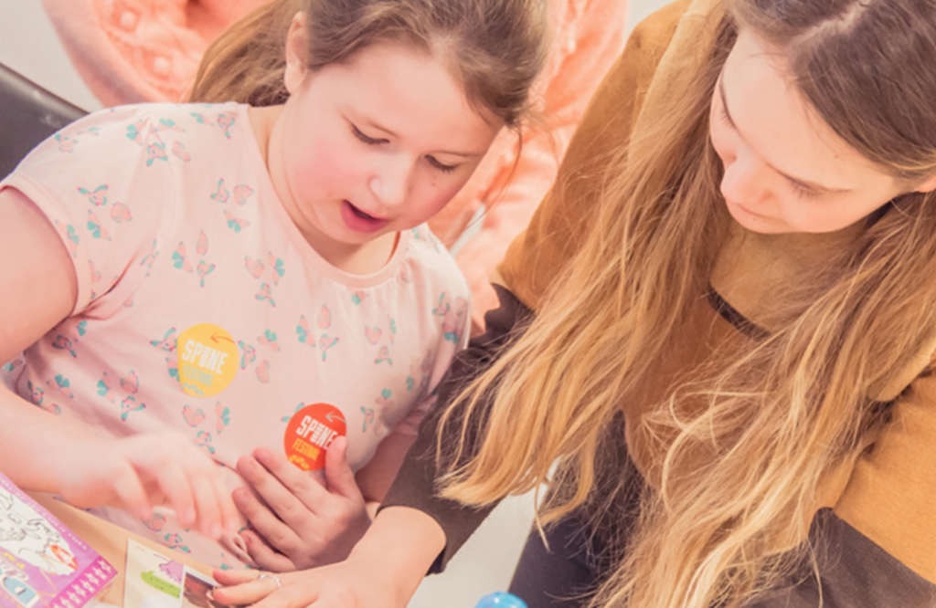 Apples and Snakes: SPINE Festival Telling Tales, Downham Library. Photo: Suzi Corker